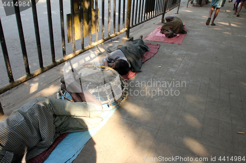 Image of Homeless people sleeping on the footpath of Kolkata