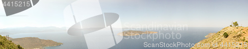 Image of sea, Psira island and mountains landscape