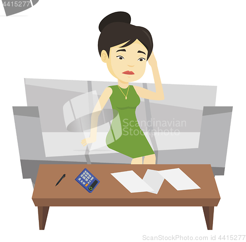 Image of Unhappy asian woman accounting home bills.