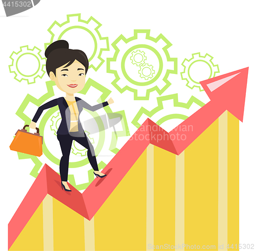 Image of Happy business woman standing on profit chart.