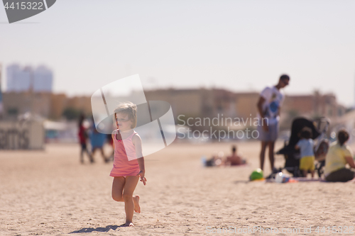 Image of little cute girl at beach