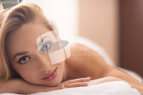 Image of woman laying on massage table