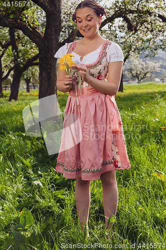 Image of laughing Bavarian young woman