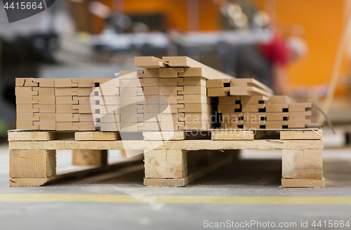 Image of wooden boards or fibreboards at woodworking plant