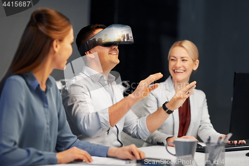 Image of developers with virtual reality headset at office