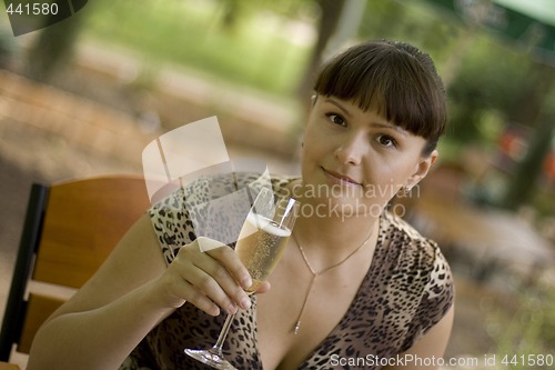 Image of beautiful woman  with champagne glass