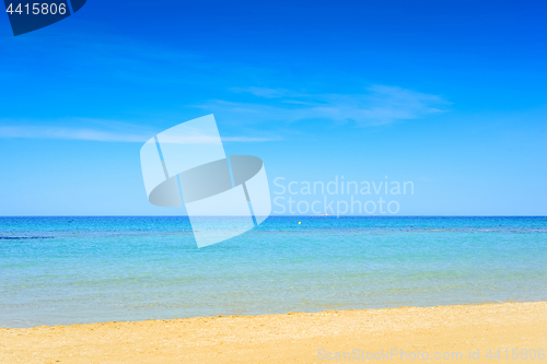 Image of European sandy beach and blue sea.