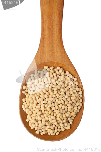 Image of White urad in a spoon