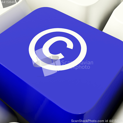 Image of Copyright Computer Key In Blue Showing Patent Or Trademark