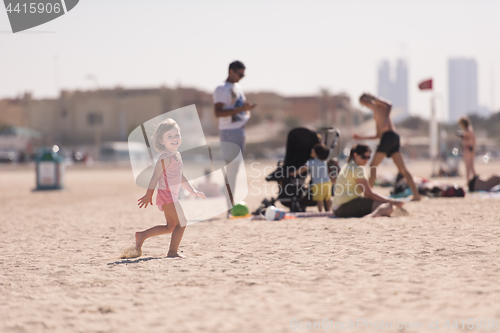 Image of little cute girl at beach