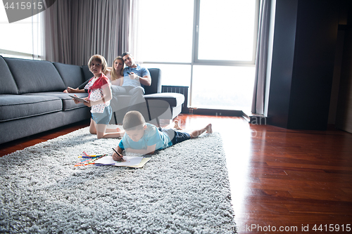 Image of young couple spending time with kids