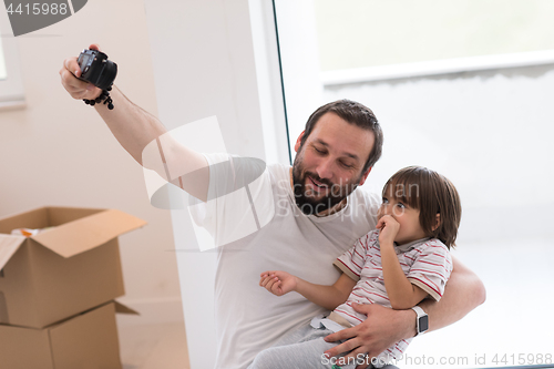 Image of selfie father and son