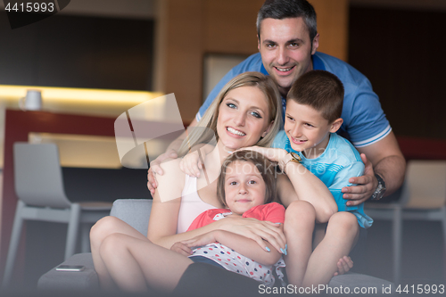 Image of couple spending time with kids