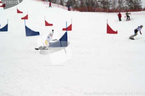 Image of Blurred background of snowboarding giant slalom competitions