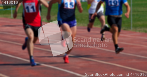 Image of Blurred view of man athletic running competition