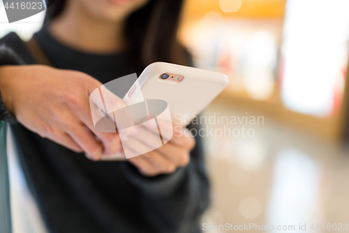 Image of Woman touch on the smart phone