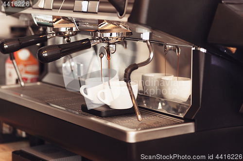 Image of Barista, cafe, making coffee, preparation and service concept
