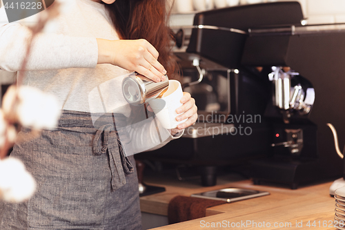 Image of Barista, cafe, making coffee, preparation and service concept