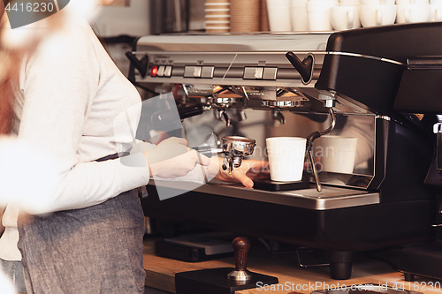 Image of Barista, cafe, making coffee, preparation and service concept