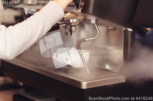 Image of Barista, cafe, making coffee, preparation and service concept