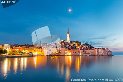 Image of Colorful sunset of Rovinj town, Croatian fishing port on the west coast of the Istrian peninsula.