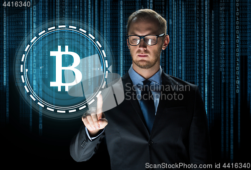 Image of close up of businessman with bitcoin hologram