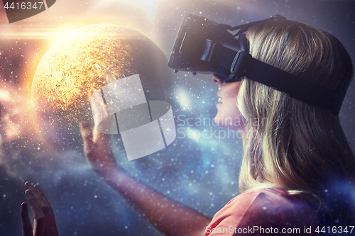 Image of woman in virtual reality headset or 3d glasses