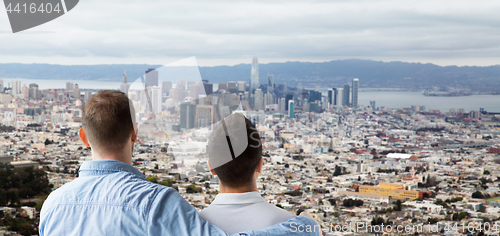 Image of close up of gay couple hugging over san francisco