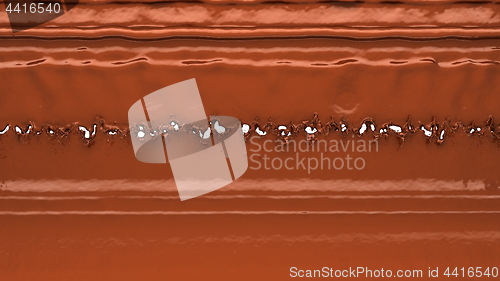 Image of Melting chocolate or cocoa coffee splashes and droplets