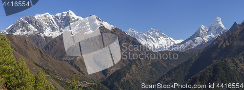 Image of Phortse village on a hill, Everest, Lhotse and Ama Dablam