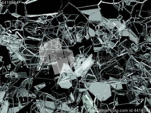 Image of Pieces of shattered or cracked glass on black