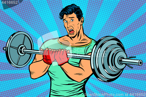 Image of shocked man with a barbell in the gym