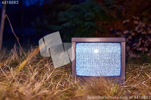 Image of TV no signal in grass