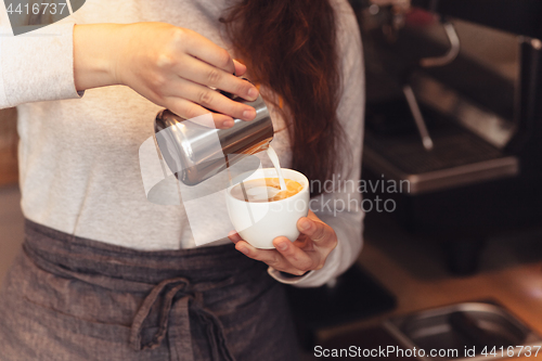 Image of Barista, cafe, making coffee, preparation and service concept