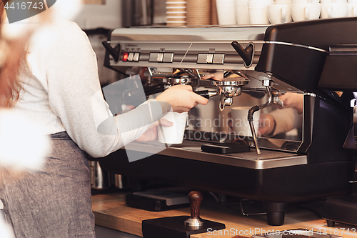 Image of Barista, cafe, making coffee, preparation and service concept