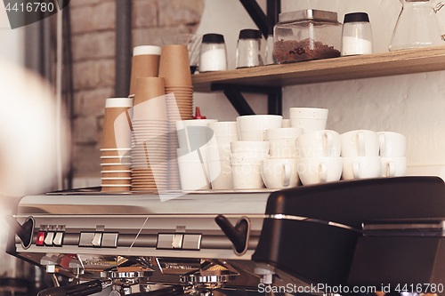 Image of A table setting for coffee on the counter at a coffee house