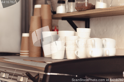 Image of A table setting for coffee on the counter at a coffee house