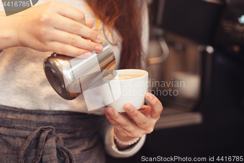 Image of Barista, cafe, making coffee, preparation and service concept