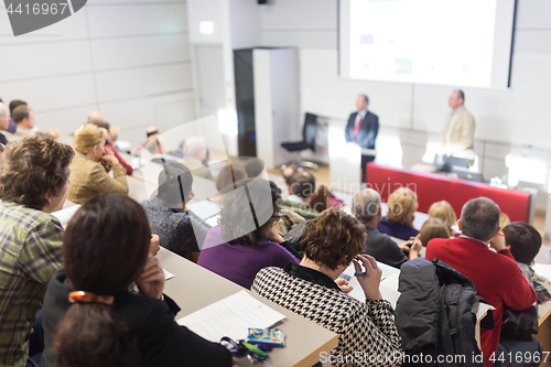 Image of Business speaker giving a talk at business conference event.