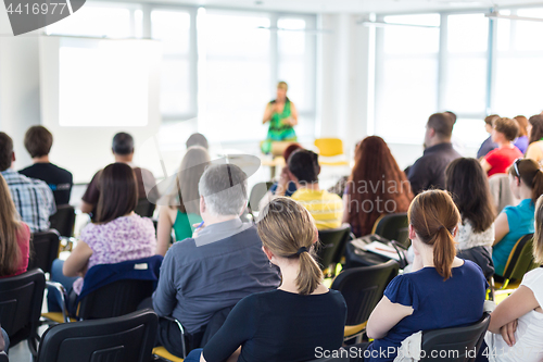 Image of Speaker giving presentation on business conference.