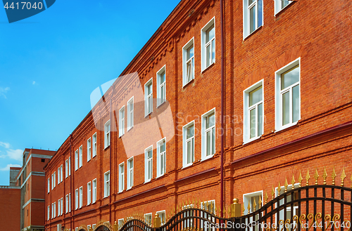 Image of Old Reconstructed Red Brick Building Under Blue Sky