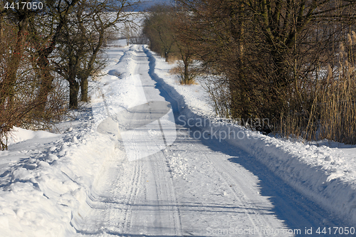 Image of Winter rural road on a sunny frosty day