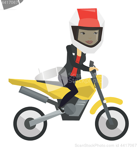 Image of Young asian woman riding motorcycle.