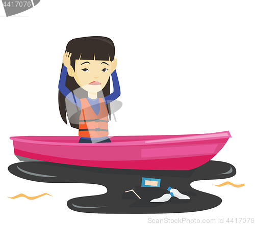 Image of Woman floating in a boat in polluted water.