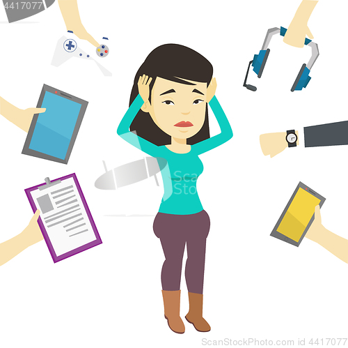 Image of Young woman surrounded with her gadgets.
