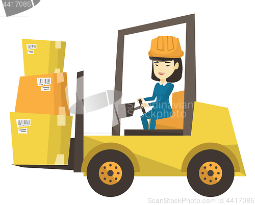 Image of Warehouse worker moving load by forklift truck.