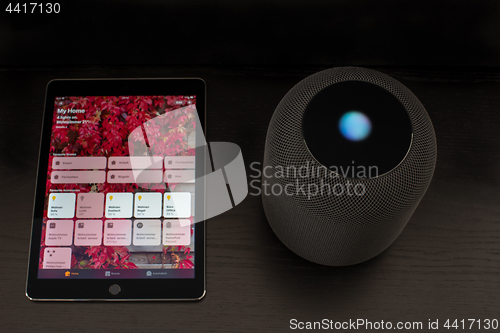 Image of Smart home using an Apple HomePod speaker and the home app on the iPad