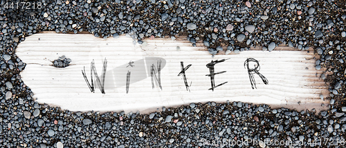 Image of Sand on planked wood - Winter