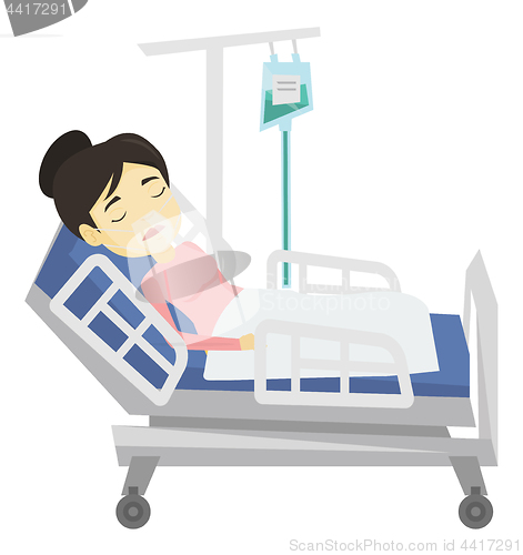 Image of Patient lying in hospital bed with oxygen mask.