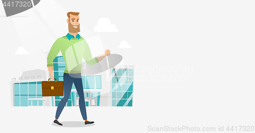 Image of Successful businessman walking in the city.